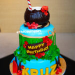 tall 3 tier Hawaiian luau birthday cake