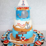 sailboat whale first birthday cake for triplets
