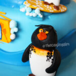 surfs up penguin cake